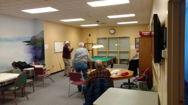 Playing Billiards at the Senior Center